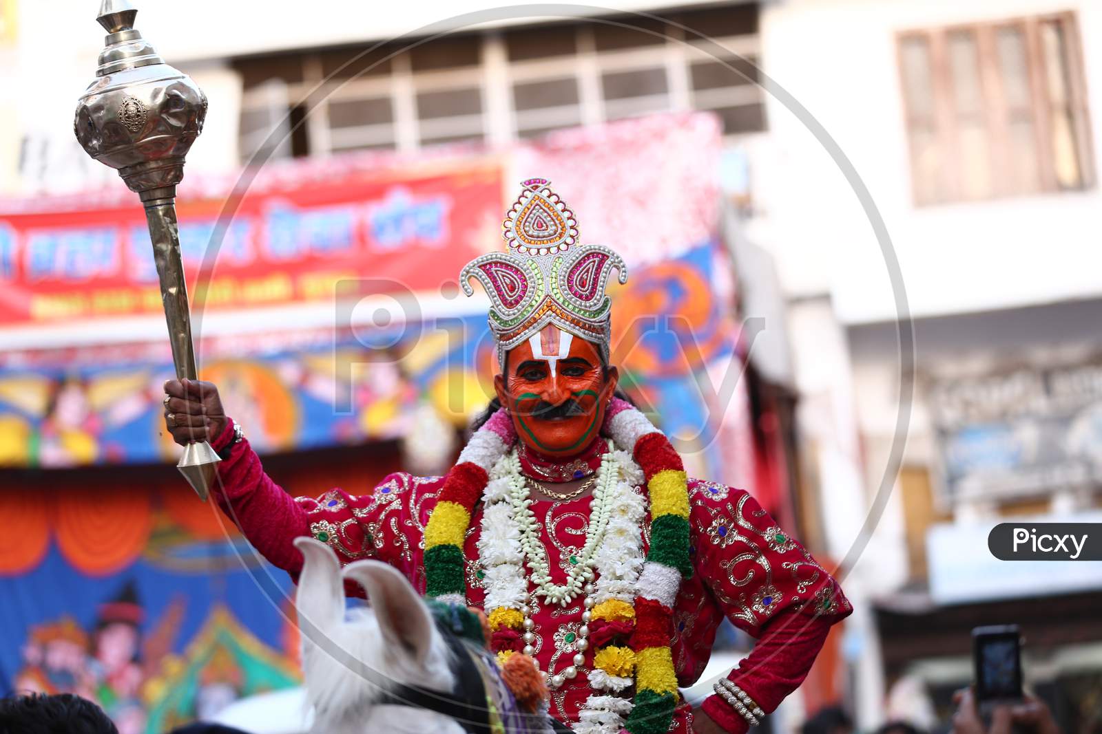 A Man dressed as Lord Hanuman during 'Dussehra' festival celebration in Pushkar, Rajasthan, India.