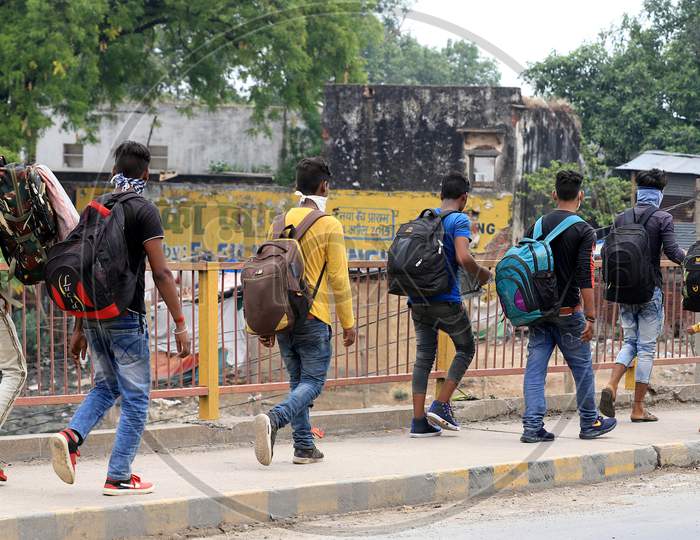 Migrants Who Arrived From Mumbai Walk To Reach Their Native Places During Nationwide Lockdown Amidst Coronavirus Or COVID-19 Pandemic in Prayagraj