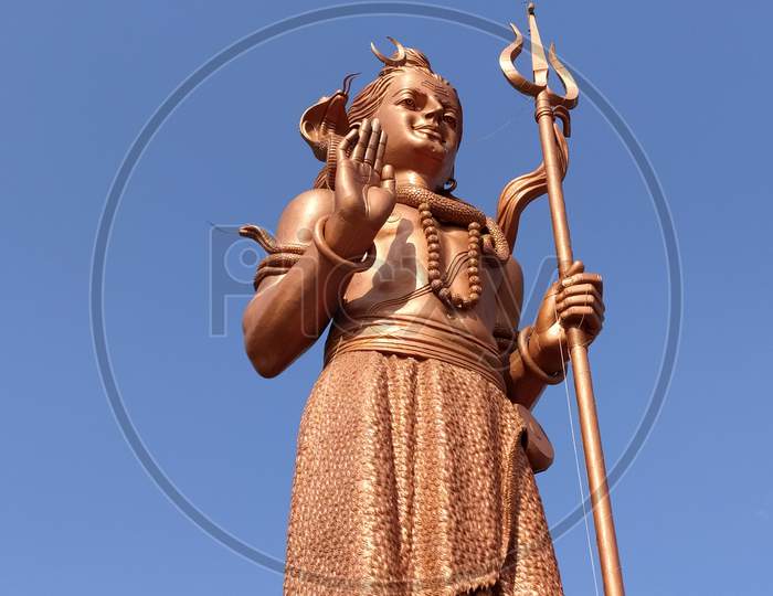 Close up view of lord shiva idol and statue.