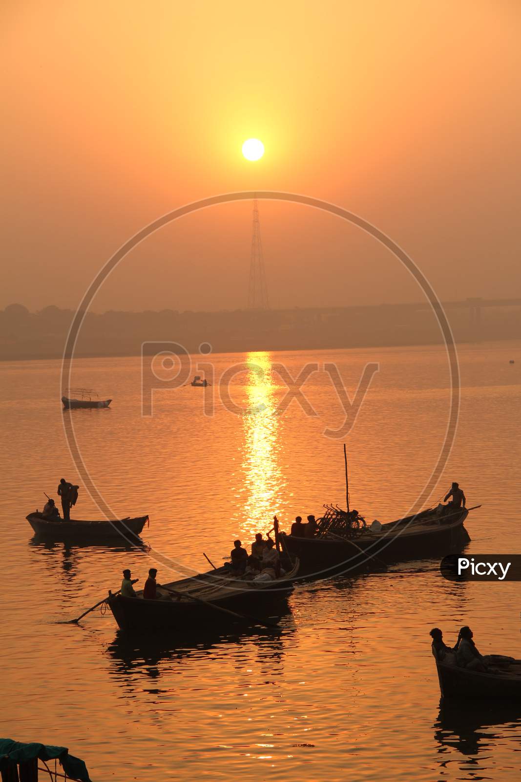 Silhouette of  Boats In  Sangam, the confluence of the Ganges, Yamuna and Saraswati rivers, Prayagraj, previously known as Allahabad, India.
