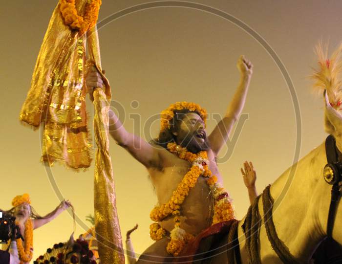 A Naga Sadhu Or A Hindu Holy Man Stands During The Shahi Snan Grand Bath At Kumbh Mela In Allahabad Uttar Pradesh India.