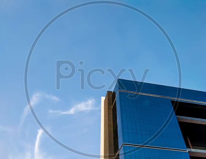 A Modern Architectural Glazing Building And Blue Sky