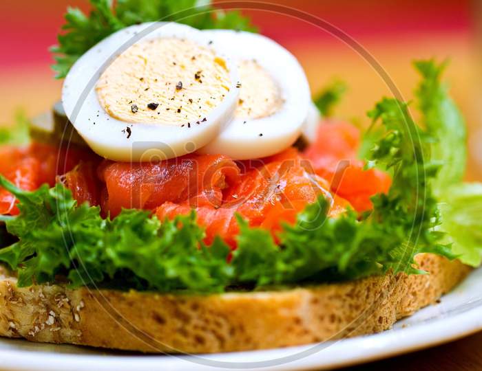 Boiled Egg with brown bread and vegetables