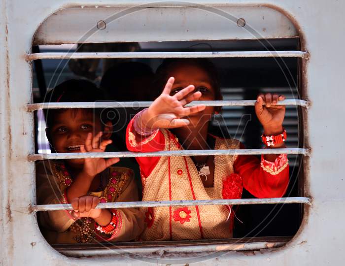 Stranded Migrants Wave As They Board A Special Train To Bihar State From Ajmer Railway Station During A Government-Imposed Nationwide Lockdown As A Preventive Measure Against The Covid-19 Coronavirus, In Ajmer On May 13, 2020.