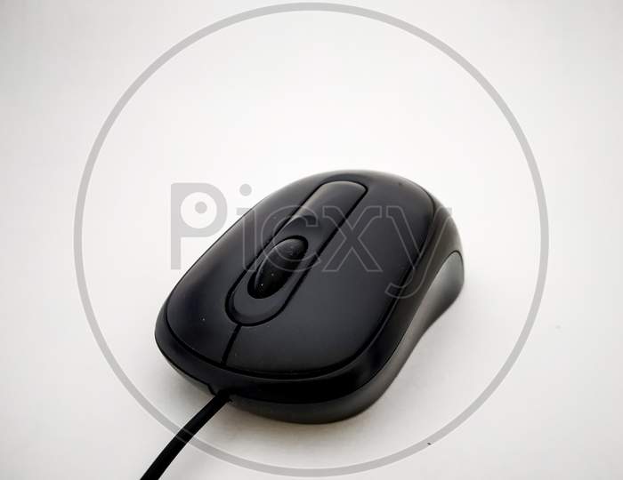 Close Up Of Black Wired Mouse Isolated With White Background