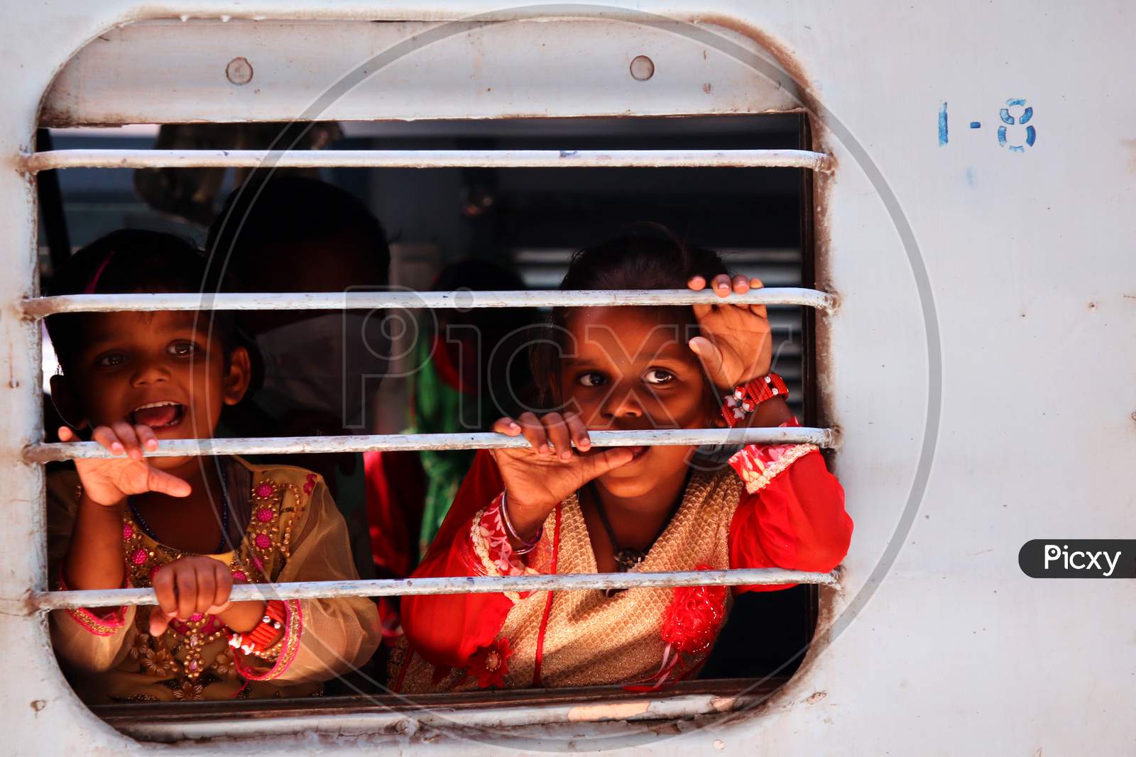 Stranded migrants board a special train to Bihar State from Ajmer railway station during a government-imposed nationwide lockdown as a preventive measure against the COVID-19 coronavirus, in Ajmer on May 13, 2020.