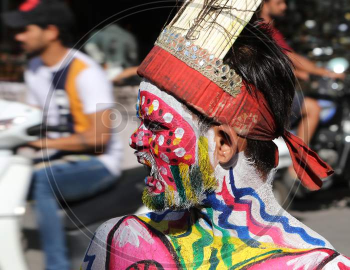 Local tribal People With Facial Paint In Gangaur Festival Udaipur On 4 April 2019.