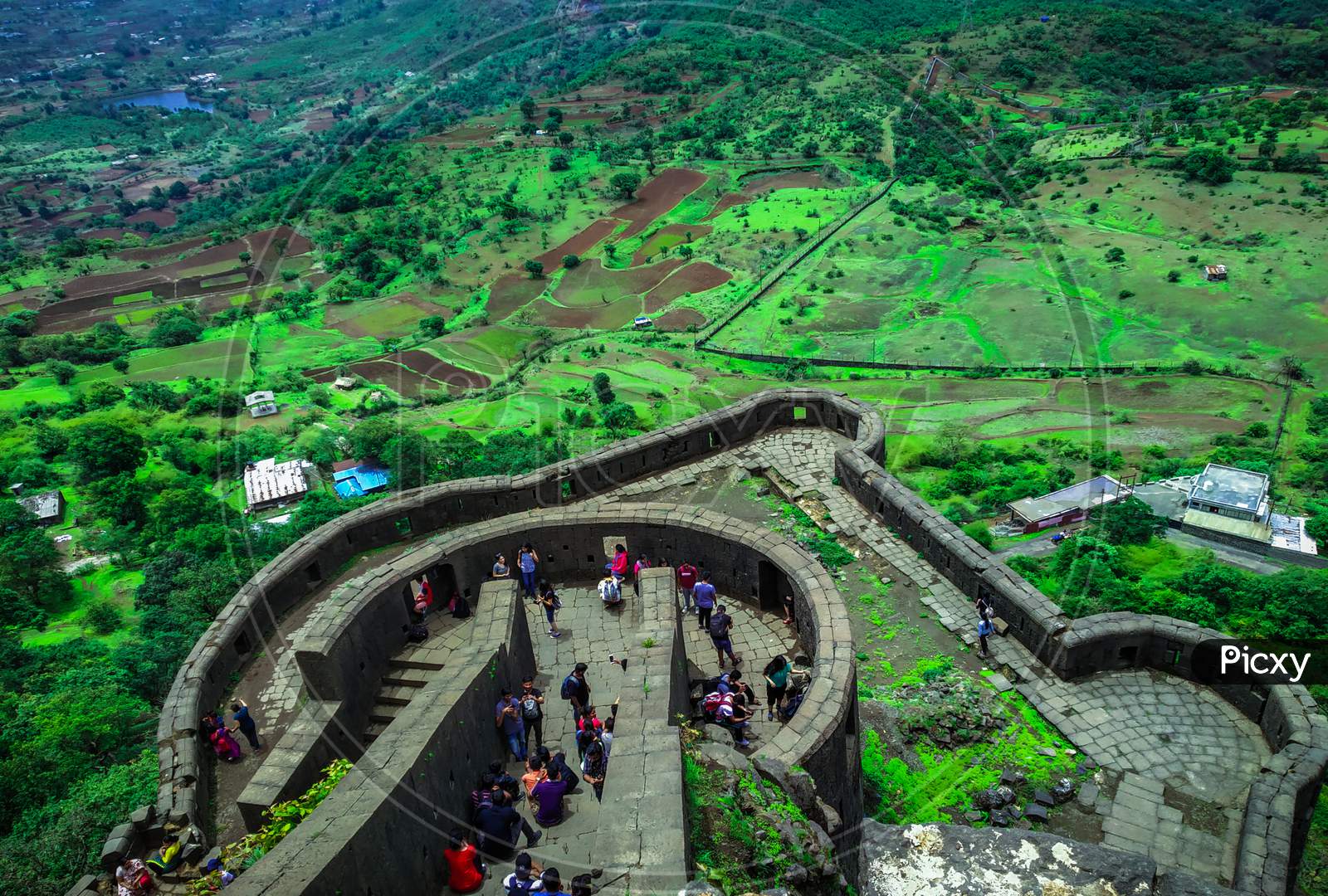 A Top View Of Lohagad, Pune, Maharashtra With The Green Background And Different Colors