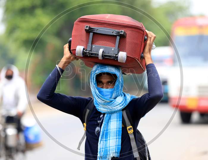 A Migrant Worker Walks To Reach Their Native Places During Nationwide Lockdown Amidst Coronavirus Or Covid-19 Pandemic In Prayagraj