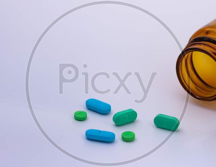 Pills Of Colors On Neutral Background. Legal Drugs From The Pharmaceutical Industry. Medicines For Use In Humans.