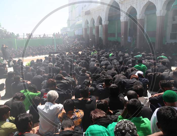 Shiite Muslim mourners flagellating themselves during a procession on the tenth day of Muharram which marks the day of Ashura in Ajmer, India.