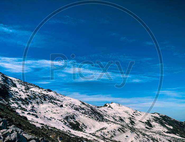 A Landscape From Himalaya Of Peak Of The Mountain Containing White Snow.
