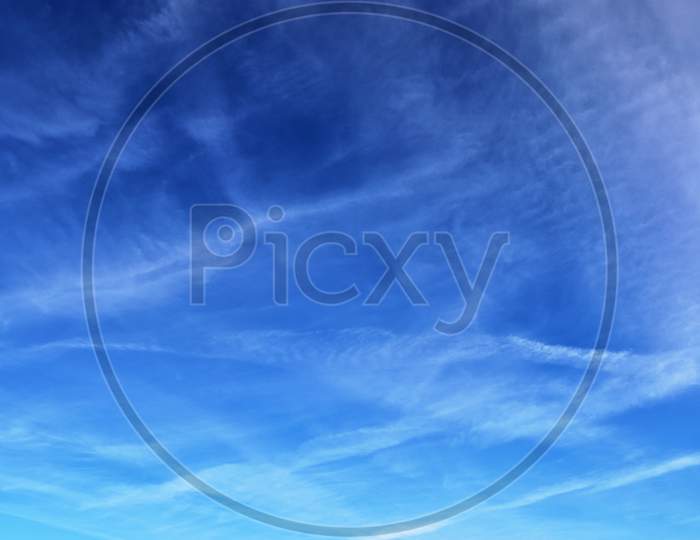 Beautiful cirrus cloud formations in a deep blue sky