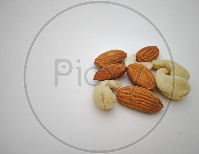 Almonds And Cashew Nuts Dry Fruits With Isolated White Background.