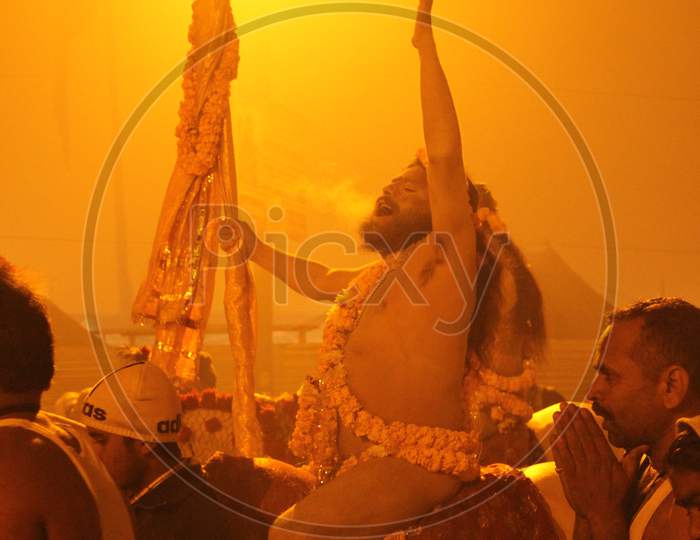 A Naga sadhu or a Hindu holy man stands during the "Shahi Snan" (grand bath) at "Kumbh Mela" in Allahabad, Uttar Pradesh, India.