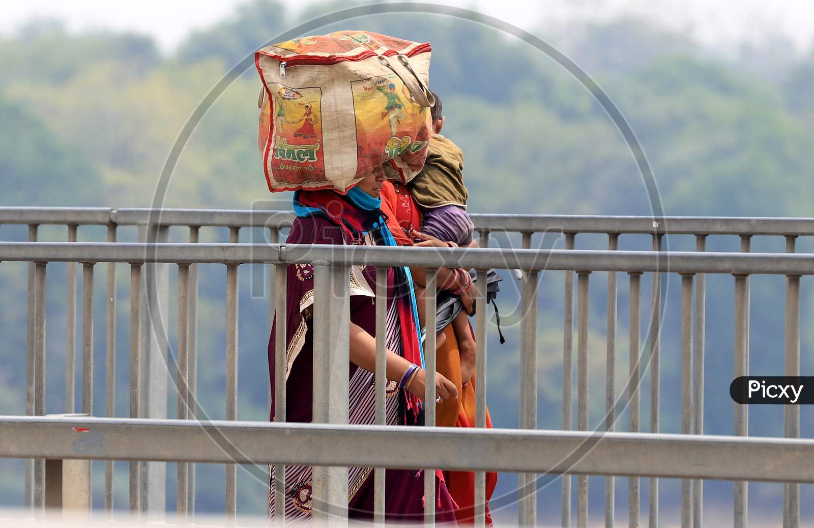  Migrants Walk To Reach Their Native Places During Nationwide Lockdown Amidst Coronavirus Or COVID-19 Pandemic in Prayagraj