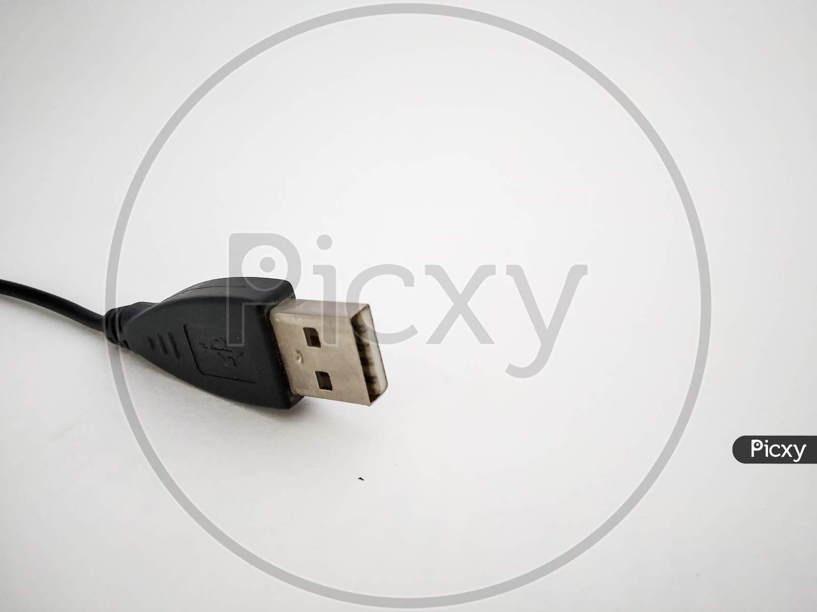 Close Up Of Usb Cord Isolated With White Background