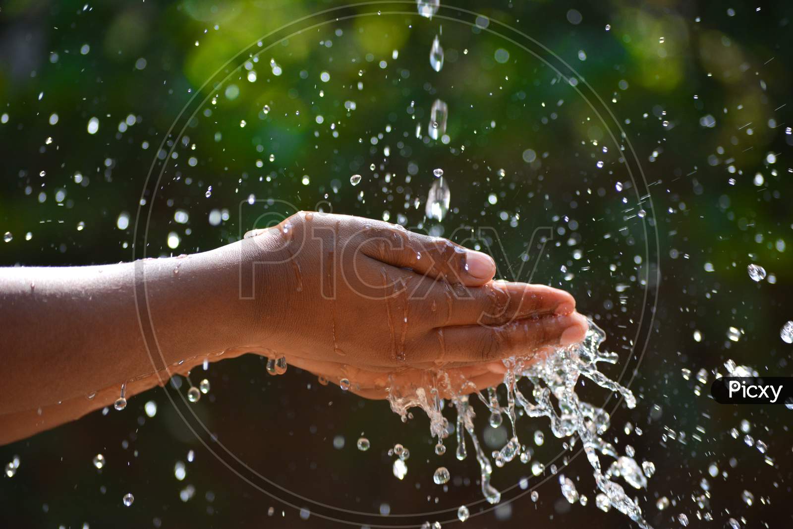 Hands with water splash