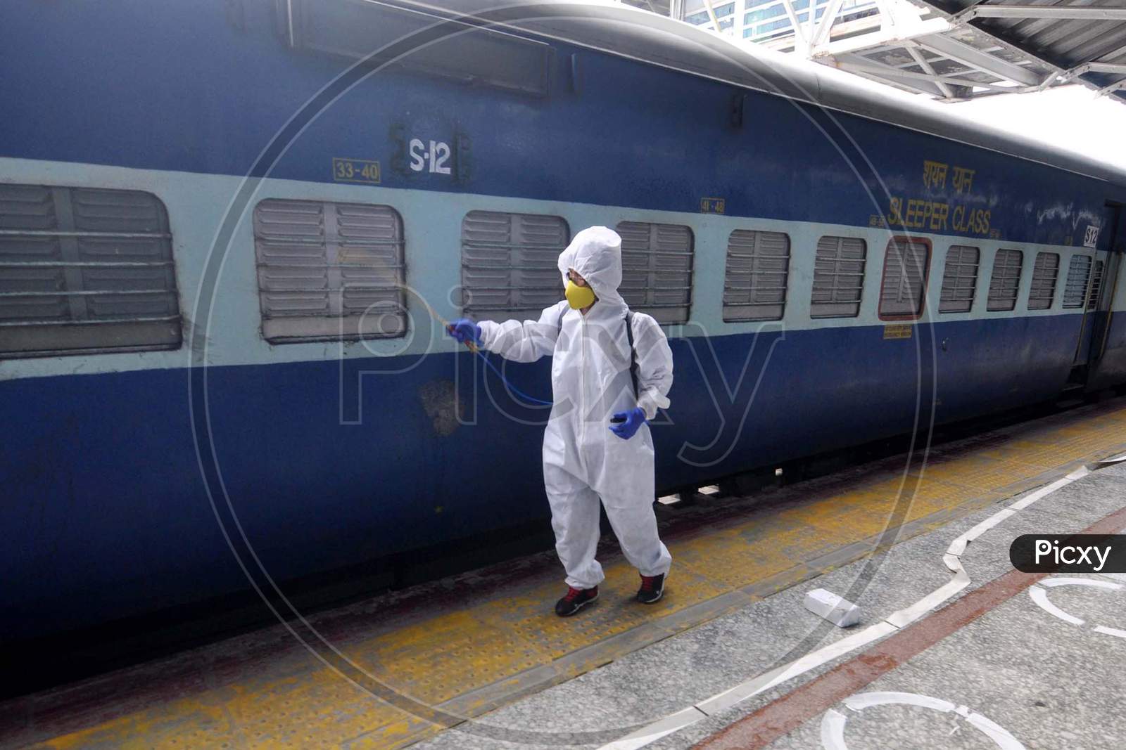 Train Coaches Being Sanitized By Workers At Guwahati Railway Station During Nationwide Lockdown Amidst Coronavirus Or Covid- 19 Pandemic In Guwahati On May 13, 2020. 