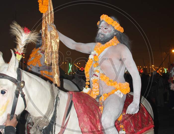 A Naga Sadhu Or A Hindu Holy Man Stands During The Shahi Snan Grand Bath At Kumbh Mela In Allahabad Uttar Pradesh India.