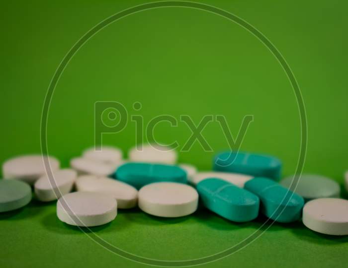Pills Of Colors In A Neutral Background. Medications In The Form Of Tablets. Drugs To Be Used Orally.