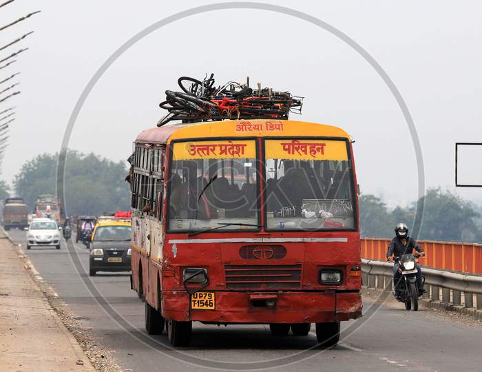 Migrants Loaded Their Bicycles on Top of a Bus During Their Travel To Native Places Amidst Lockdown For Coronavirus Or COVID-19 Pandemic in Prayagraj