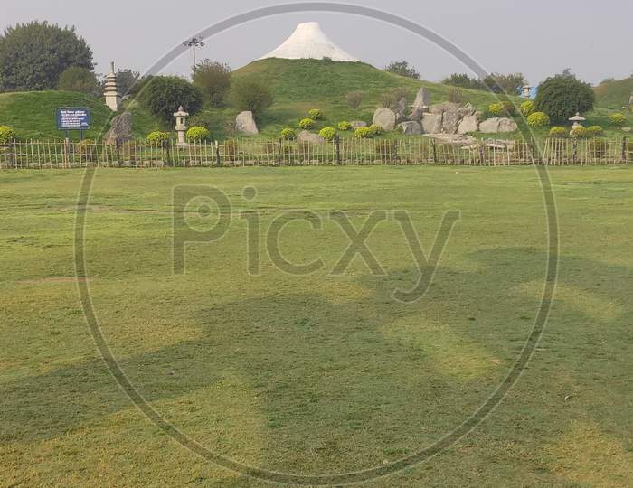 Indraprastha Park is a Large public green space with a playground, amphitheater & Buddhist stupa dedicated to world peace.
