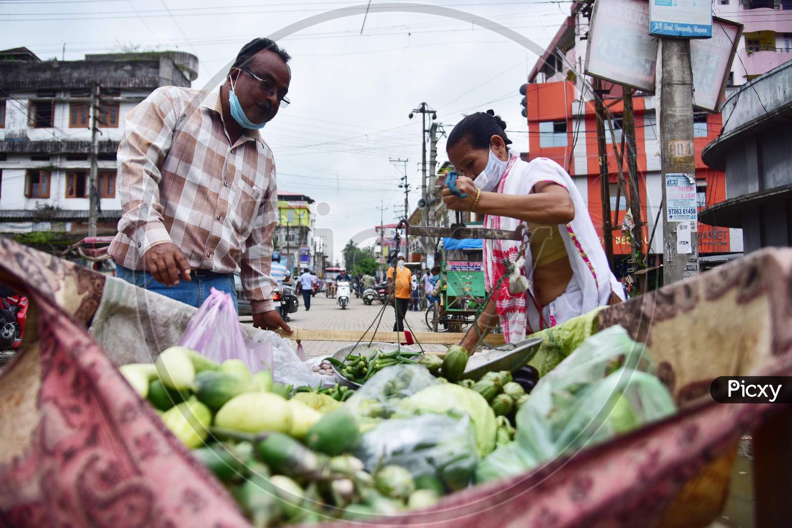 A Woman Selling Vegetables On Roads During Nationwide Lockdown Amidst Coronavirus Or COVID-19 Pandemic in Nagaon on May 14 2020
