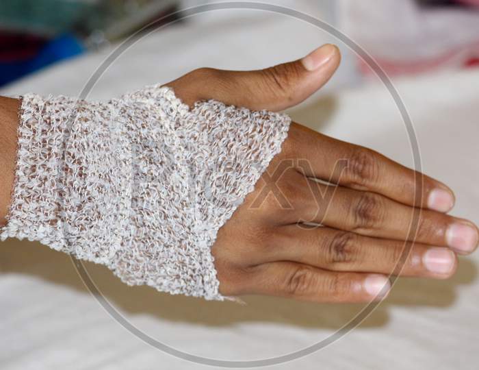 Dressing Bandaged Hand