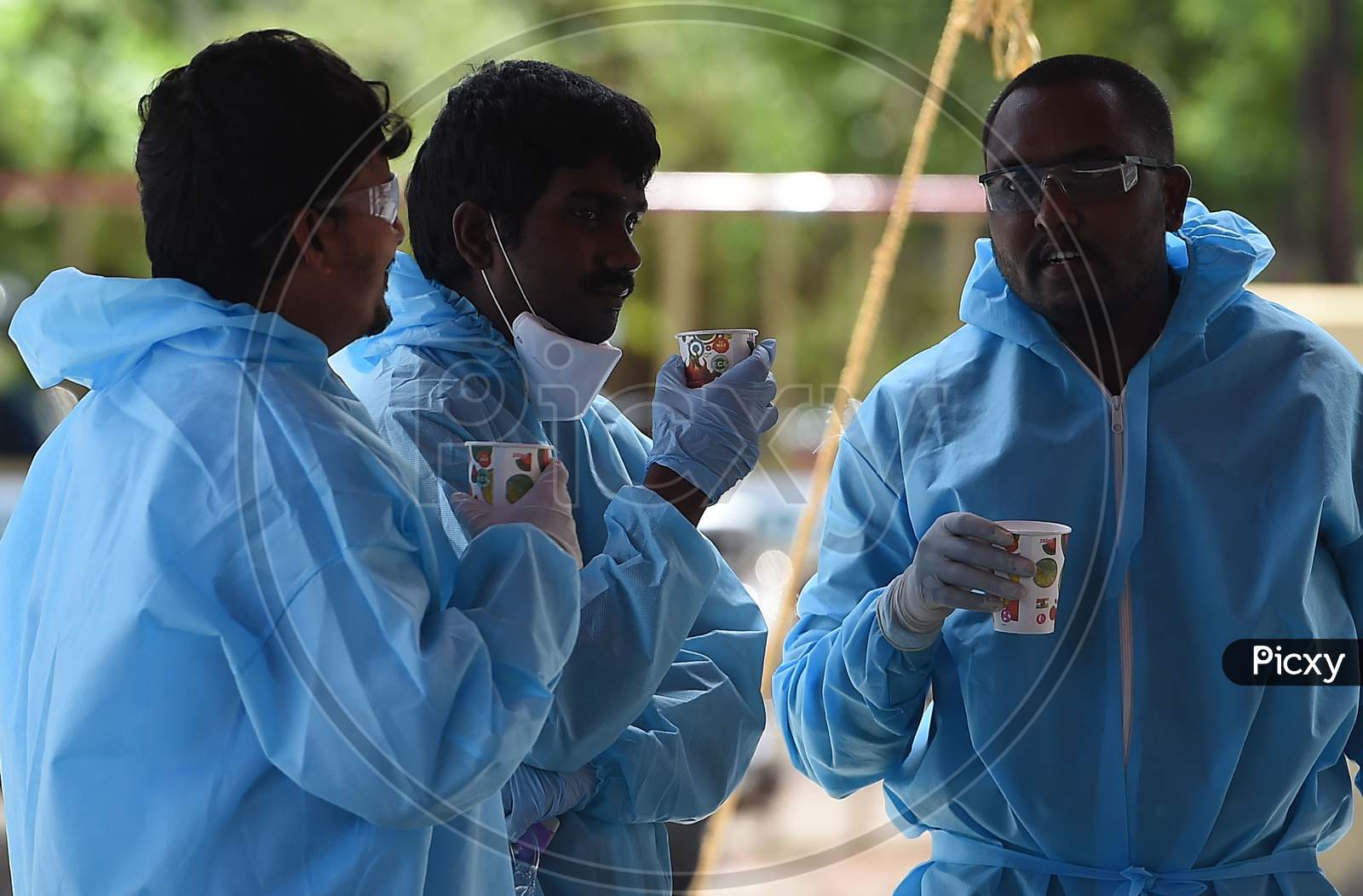 Health Workers Take A Break Before Conducting The Thermal Screening Of Migrant Labourers From Bihar During The Ongoing Nationwide Lockdown In The Wake Of Coronavirus Pandemic, In Chennai