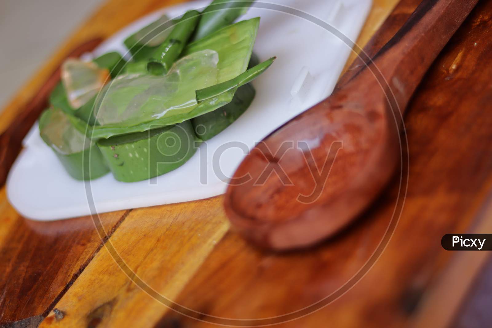 Aloevera Gel Pieces  in a Plate On an Wooden Background
