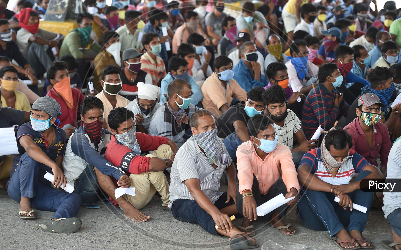 Migrant Labourers From Bihar Wait For Thermal Screening And Document Verification Before They Leave To Their Native Places During The Ongoing Nationwide Lockdown In The Wake Of Coronavirus Pandemic, In Chennai