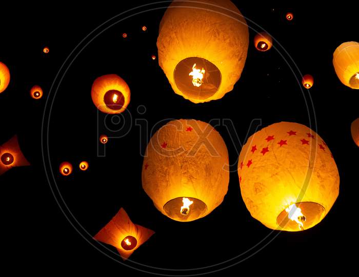 Beautiful Views Of Lanterns Being Released Into The Dark Sky During Probarona Purnima Festival At Rajguru Buddhist Temple, Keang Mor, Bandarban, Bangladesh.