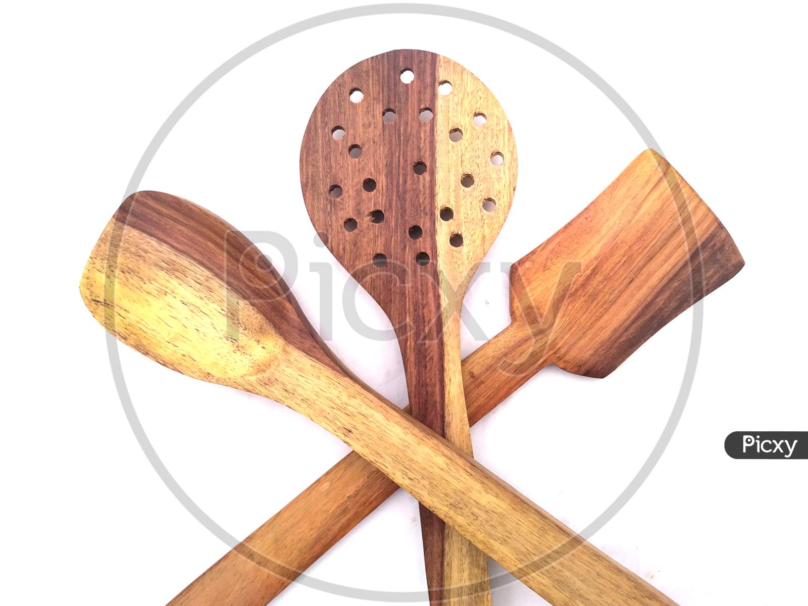 some wooden spatulas isolated on white background