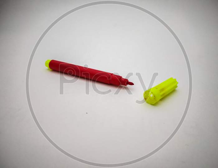 Red Sketch Pen Isolated With White Background.