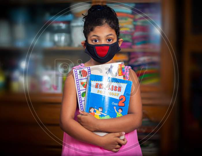 Bangladesh – April 15, 2020: A Teenage Girl Wearing A Protective Cloth Mask Against Transmissible Covid-19 Diseases And She Stay His Home At Dhaka.