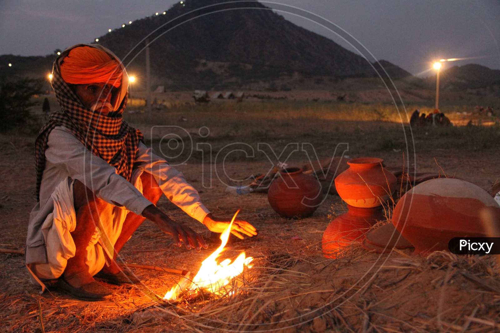 Camel Traders making Camp Fire At Pushkar Camel Fair, Pushkar