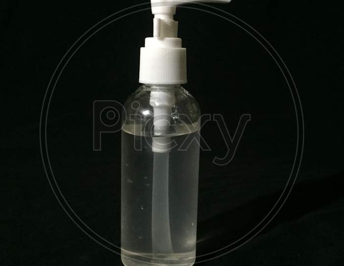 Sanitizer bottle on black background