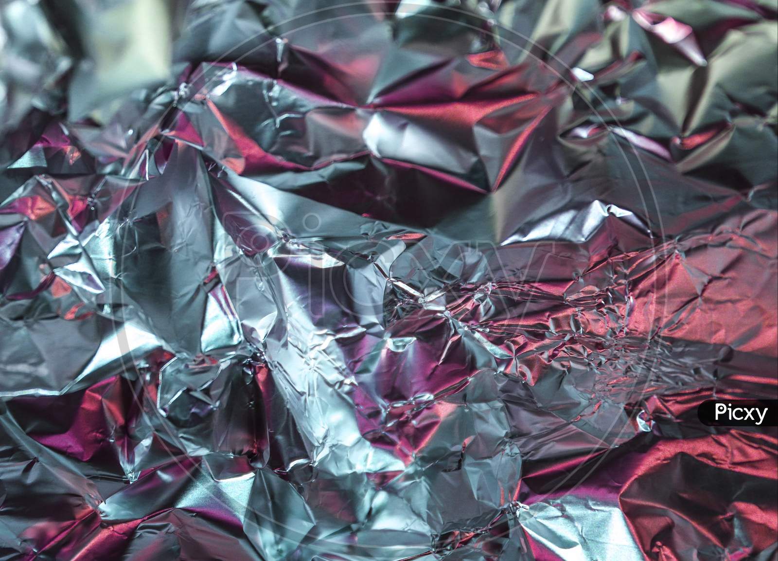 Detailed Close Up Texture Of An Aluminum Foil Surface In Different