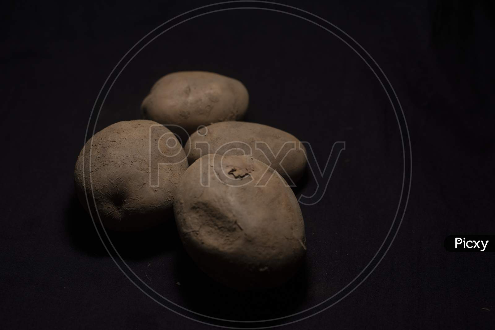 A Collection Of Potato In Dark Copy Space Background. Food And Product Photography.