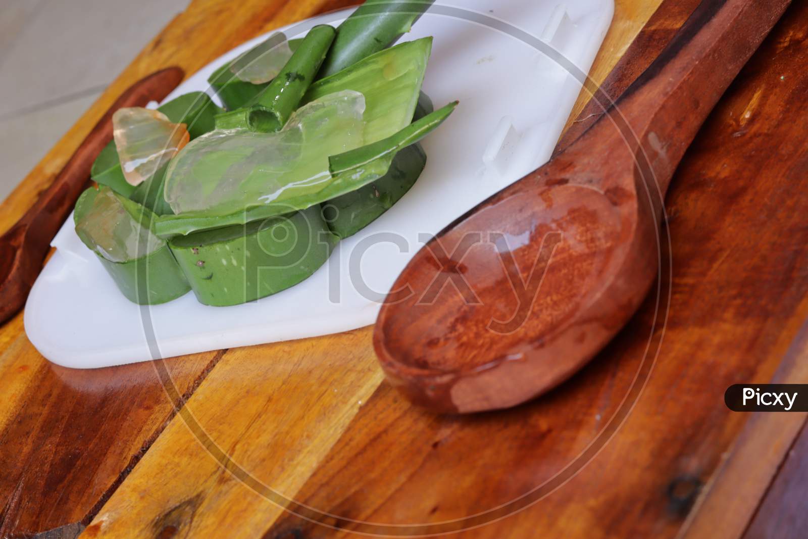Aloevera Gel Pieces  in a Plate On an Wooden Background