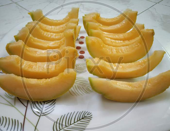 Fresh Juicy melon slices with vitamins for nutritional diet