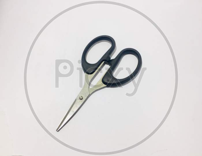 Scissors hand operated cutting instruments