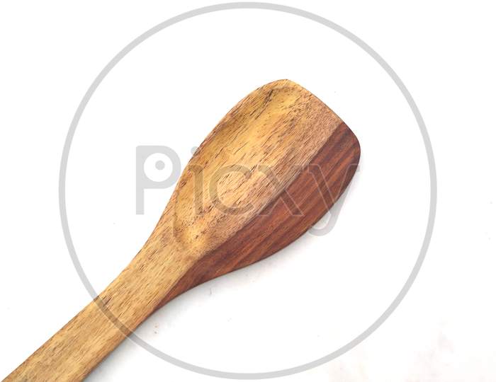 some wooden spatula isolated on white background