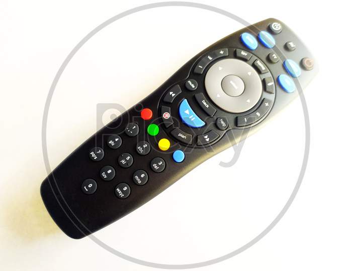 a black television remot control isolated on whitebackground