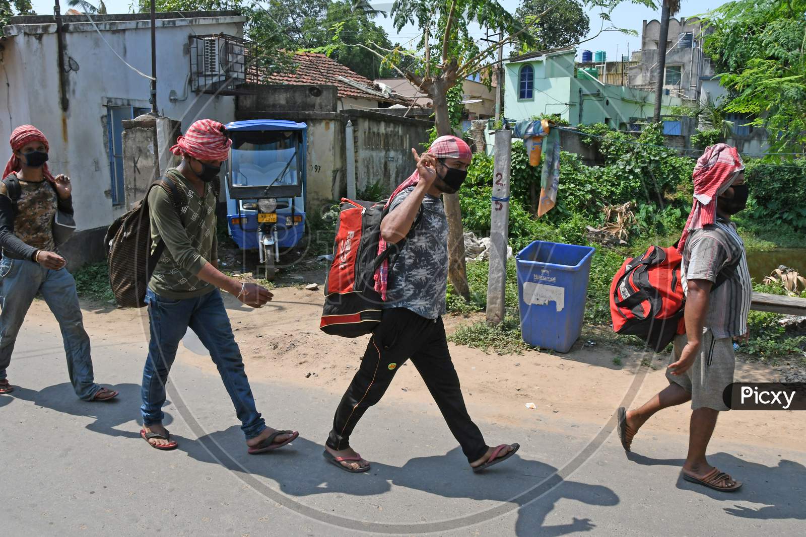 Migrant workers from Kanpur are returning to their homes in the state of West Bengal on their own initiative during lockdown period due to Novel Coronavirus (COVID-19) emergence.