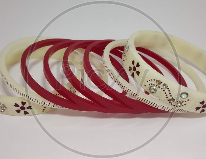 Close up view of Red, white bangles (fashion accessory)