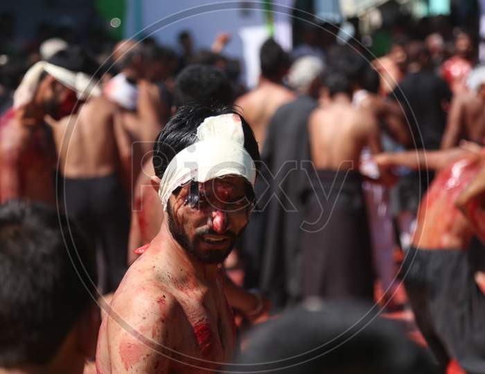 Shiite Muslim mourners flagellate themselves during a procession on the tenth day of Muharram which marks the day of Ashura in Ajmer, India.