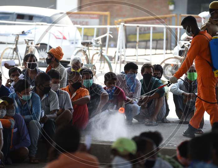 Migrant Labourers From Bihar Wait To Get Thermal Screening And Document Verification Before They Leave To Them Native Places During The Ongoing Nationwide Lockdown In The Wake Of Coronavirus Pandemic, In Chennai