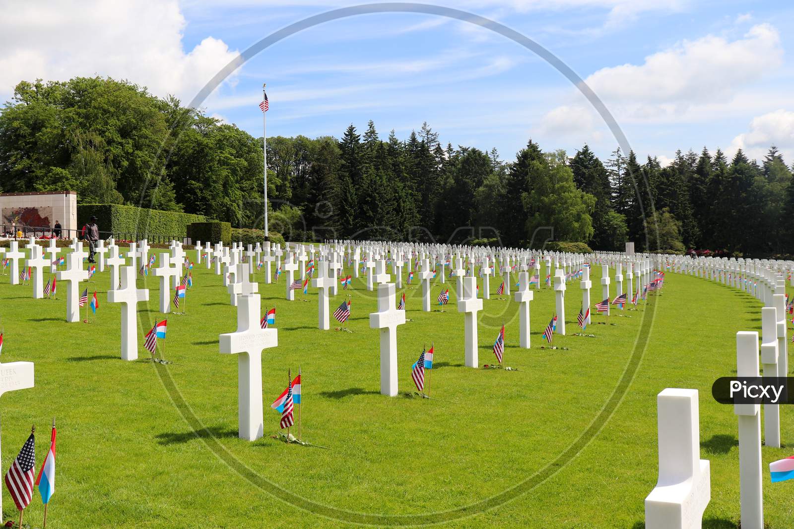 Rows Of Headstones At A Military Cemetery